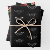 Bookish Dragon Christmas Wrapping paper gift wrap (In situ)