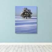 Boom in met sneeuw bedekt landschap canvas afdruk (Insitu (Houten vloer))