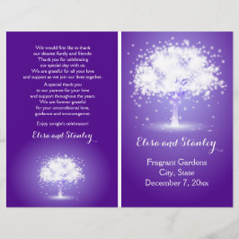 Boom met mousserende lichten paars trouwprogramma