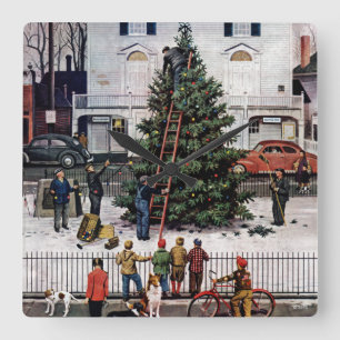 Boom op het stadsplein vierkante klok