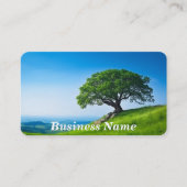Boom op heuvel tegen heldere blauwe lucht visitekaartje (Voorkant)