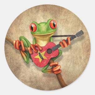 Boomkikker die Vietnamese vlaggitaar speelt Ronde Sticker
