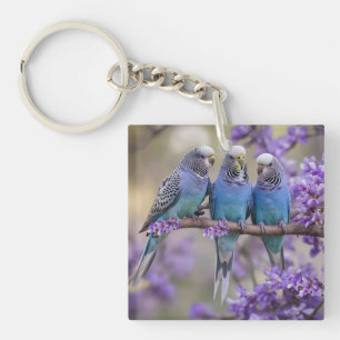 Boomtop Chatter: Blauwe Budgies in Jacaranda Tree, Sleutelhanger