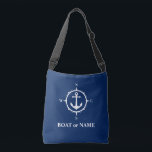 Bootnaam nautisch kompas anker marine blauw crossbody tas<br><div class="desc">Stijlvolle marineblauwe crossbody canvas tas met uw gepersonaliseerde naam, bootnaam of andere gewenste tekst. Beschikt over een op maat ontworpen nautisch anker en kompas. Pas eenvoudig de basiskleur aan uw huidige decor of thema aan. Geweldig voor vakantie, winkelen en reizen. Het perfecte gepersonaliseerde cadeau voor elke gelegenheid.</div>