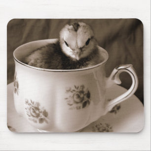 Boots in een theebeker muismat