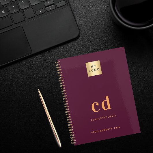 Bordeauxrode monogram initiaal bedrijfslogo notitieboek