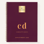 Bordeauxrode monogram initiaal bedrijfslogo notitieboek (Voorkant)