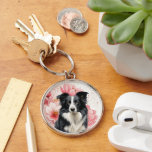 Border Collie Dog and Bold Pink Lilies Sleutelhanger<br><div class="desc">This keychain is a great gift or stocking stuffer and features a Border Collie sitting against a backdrop of big, bold pink lilies in a botanical dog lover image.</div>