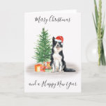 Border Collie Merry kerstkerstkersthond Feestdagen Kaart<br><div class="desc">Stuur kerstgroeten dit vakantieseizoen met deze vrolijke kerst border collie santa hond vakantie kaart, en bijpassende decor. Deze border collie vakantiekaart is voorzien van een waterverf hond in een kerstmuts en boompje. Personaliseer met bericht en familienaam. Deze border collie kerstkaart zal een favoriet zijn onder border collie liefhebbers, hondenliefhebbers en...</div>