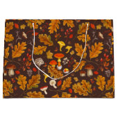 Bospaddenstoelen en herfstflora op bruin groot cadeauzakje (Voorkant)