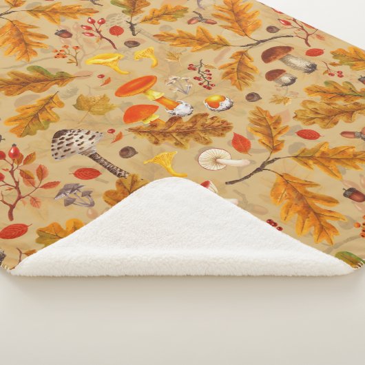 Bospaddenstoelen en herfstflora op oker sherpa deken (3/4)