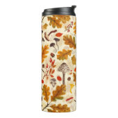 Bospaddenstoelen en herfstflora op room thermosbeker (Gedraaid links)