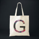 Botanische paarse bloemen letter G monogram Tote Bag<br><div class="desc">Botanische paarse bloemen letter g monogram Canvas tas | Moderne en elegante monogram canvas tas met waterverf illustratie van bloemen met een houtskool achtergrond. Deze botanische canvas tas zal een perfect persoonlijk geschenk zijn. Andere letters en kleuren zijn beschikbaar.</div>