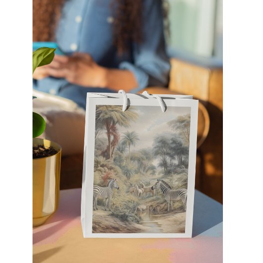 Botanische scène van zebra's en leeuwen in een oas klein cadeauzakje