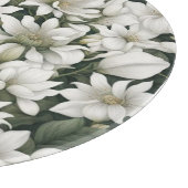 Botanische witte bloemen op groene bladeren snijplank (Hoek)