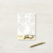 Boter en dragonfly met rode bloemen post-it® notes (Op bureau)