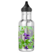 Boter op paarse bloemen met scripts waterfles  (Rechts)
