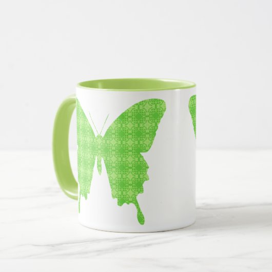 Botervlieg in behangselpapier - kalkgroen mok (Voorkant links)