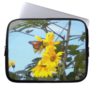 Botervlieg in de hoes van de zonnebloemen laptop