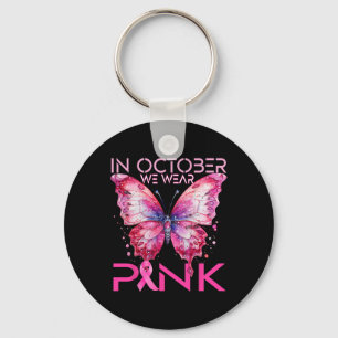 Botervlieg in oktober Draag roze borstkanker. Sleutelhanger