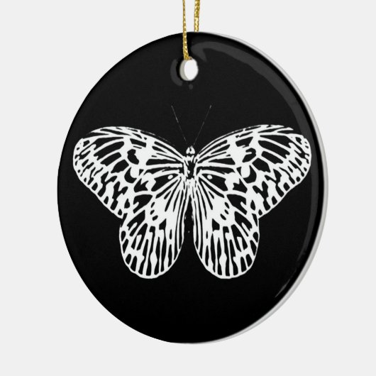 Botervliegschets, wit en zwart keramisch ornament (Links)