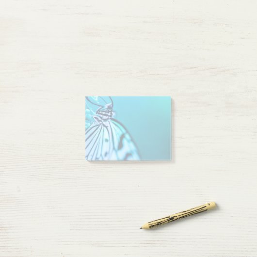 Botervliesblauwe en zwarte foto post-it® notes (Op bureau)