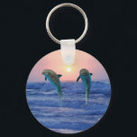 Bottlenose Dolphin op Sunrise Sleutelhanger<br><div class="desc">Samen met snelheid, toewijding en intelligentie is Dolphin ook een boodschapper van liefde. Dit is deels te danken aan de band met Delphi, die de liefde in de baarmoeder betekent. Aphrodite, de Griekse godin van de liefde, zou de vorm hebben van de dolfijn en ook bekend staan als de vrouw...</div>