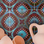 Bourgogne Rood Blauw Symmetrisch Geometrisch Petaa Tegeltje<br><div class="desc">Deze keramische tegel is een boeiend kunstwerk, met een ingewikkeld en symmetrisch ontwerp dat doet denken aan bloeiende bloemen of caleidoscopische beelden. Het ontwerp wordt gedomineerd door vormen die lijken op bloemblaadjes, weergegeven in rijke tinten van bordeauxrood en levendig rood. Deze vormen worden geschetst met delicate lijnen, waardoor definitie en...</div>