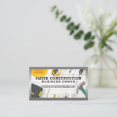 Bouwgereedschap op tabel visitekaartje (Staand voorkant)