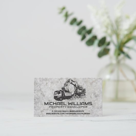 Bouwvoertuig graaft | Betonachtergrond Visitekaartje (Staand voorkant)