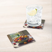 Bowl van fruit zittend op een tafel olieverfschild kartonnen onderzetters (Insitu)