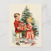 Boy and girl giving each other Christmas presents Briefkaart (Voorkant)