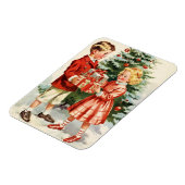 Boy and girl giving each other Christmas presents Magneet (Linkerzijde)
