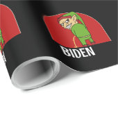 BOY ELF PEELT OP HET BIDEN CHRISTMAS WRAPPING PAPI CADEAUPAPIER (Rol Hoek)