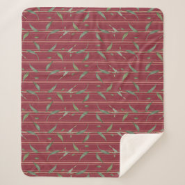 Branch of leaves on red wallpaper sherpa deken