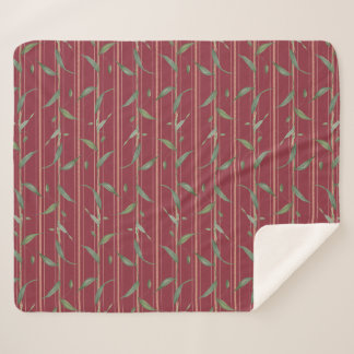Branch of leaves on red wallpaper sherpa deken