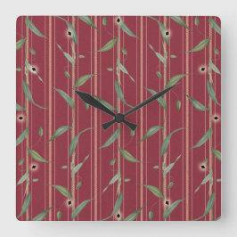 Branch of leaves on red wallpaper vierkante klok