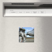 Brandweerlieden plaatsen een brandslang tijdens ee magneet (Insitu (Vaatwasser))