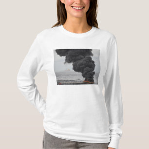 Brandwonden van geconcentreerde olie t-shirt