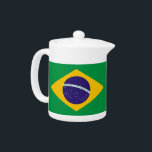 Braziliaanse vlag theepot<br><div class="desc">Voeg een vleugje Braziliaanse charme toe aan je theetijd met onze exclusieve theepot met de vlag van Brazilië! Deze theepot is vervaardigd met nauwgezette aandacht voor detail en is meer dan alleen een functioneel keukenitem; het is een viering van het Braziliaanse erfgoed en de nationale trots. Het ontwerp toont de...</div>