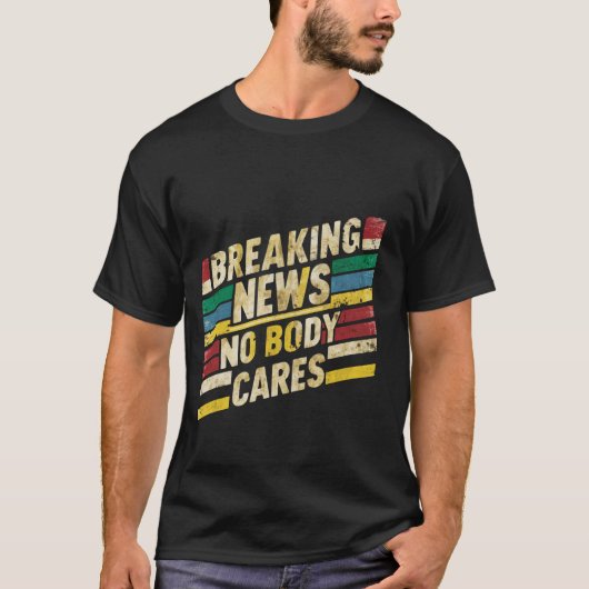 Breaking News, het kan niemand iets schelen _- T-shirt (Voorkant)
