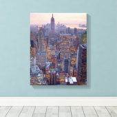 Breed uitzicht van Manhattan bij zonsondergang Canvas Afdruk (Insitu (Houten vloer))