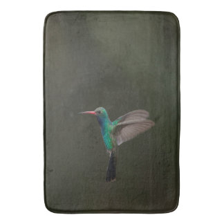 Breedbevochtigde vogel tijdens de vlucht badmat