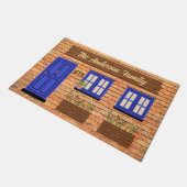 Brick House met blauwe deur aangepaste tekst Deurmat (Schuin)