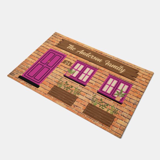 Brick House met roze deur aangepaste tekst Deurmat (Schuin)