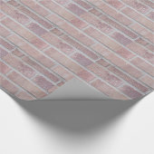 Brick in de wand die papier wikkelt (Hoek)