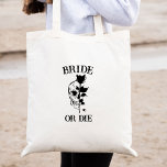 Bride of Die Til Death Do US Party gothic Wedding Tote Bag<br><div class="desc">Op zoek naar de perfecte manier om je gotische bruiloft te vieren? Kijk niet verder dan onze gepersonaliseerde bride canvas tas! Deze tas is perfect voor het dragen van een aantal essentiële dingen op je grote dag, en het maakt je vrijgezellenfeest zeker nog leuker! Met donkere sprookjesbruiloft-design en een Bride...</div>