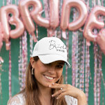 Bride Personalized Bachelorette Party Cap Trucker Pet<br><div class="desc">Celebrate the bride-to-be with this chic and fun personalized trucker hat — the perfect accessory for bachelorette parties, beach getaways, and wedding prep! Featuring a modern script "Bride" with heart detail and a customizable name, this lightweight and breathable cap keeps her stylish and sun-safe. Available in a variety of colors...</div>