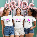 Bride Squad | Hot-roze Bachelorette Bridesmaid T-shirt<br><div class="desc">Kute, eenvoudige, stijlvolle "Bride Squad" citeert kunstvrouwtjes t-shirt met moderne, minimalistische typografie in zwart-wit-roze in een koele trendy stijl. De slogan, de naam en de rol kunnen gemakkelijk gepersonaliseerd worden met de namen van je bruidfeest, bijvoorbeeld bruid, bruidsmeisje, bloemmeisjes, moeder van de bride, Glam Squad en nog veel meer! De...</div>