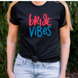 Bride Vibes Bachelorette Party T Shirt<br><div class="desc">Funny Bride Vibes Bachelorette Party T Shirt. Eenvoudige tekst die Bride Vibes met kleurrijke letters zegt die echt op een zwart t shirt pop. Wees de vrouw van het feest in deze leuke meiden,  nacht uit de buurt.</div>